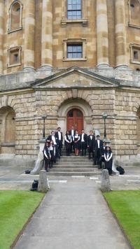 group on steps of radcliffe camera